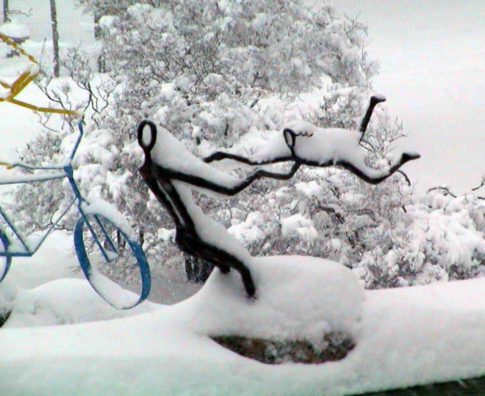 Bronze Swinging Jenny in the snow