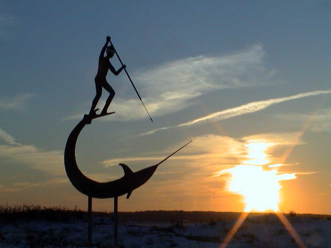 Winter Sunset at Menemsha with the Swordfish Harpooner Sculpture by Jay Lagemann